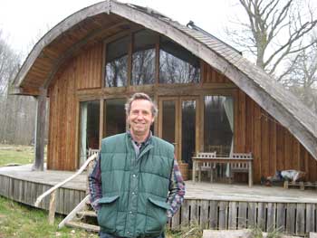 Alan in front of the Forest Ark at Hazel Hill Wood